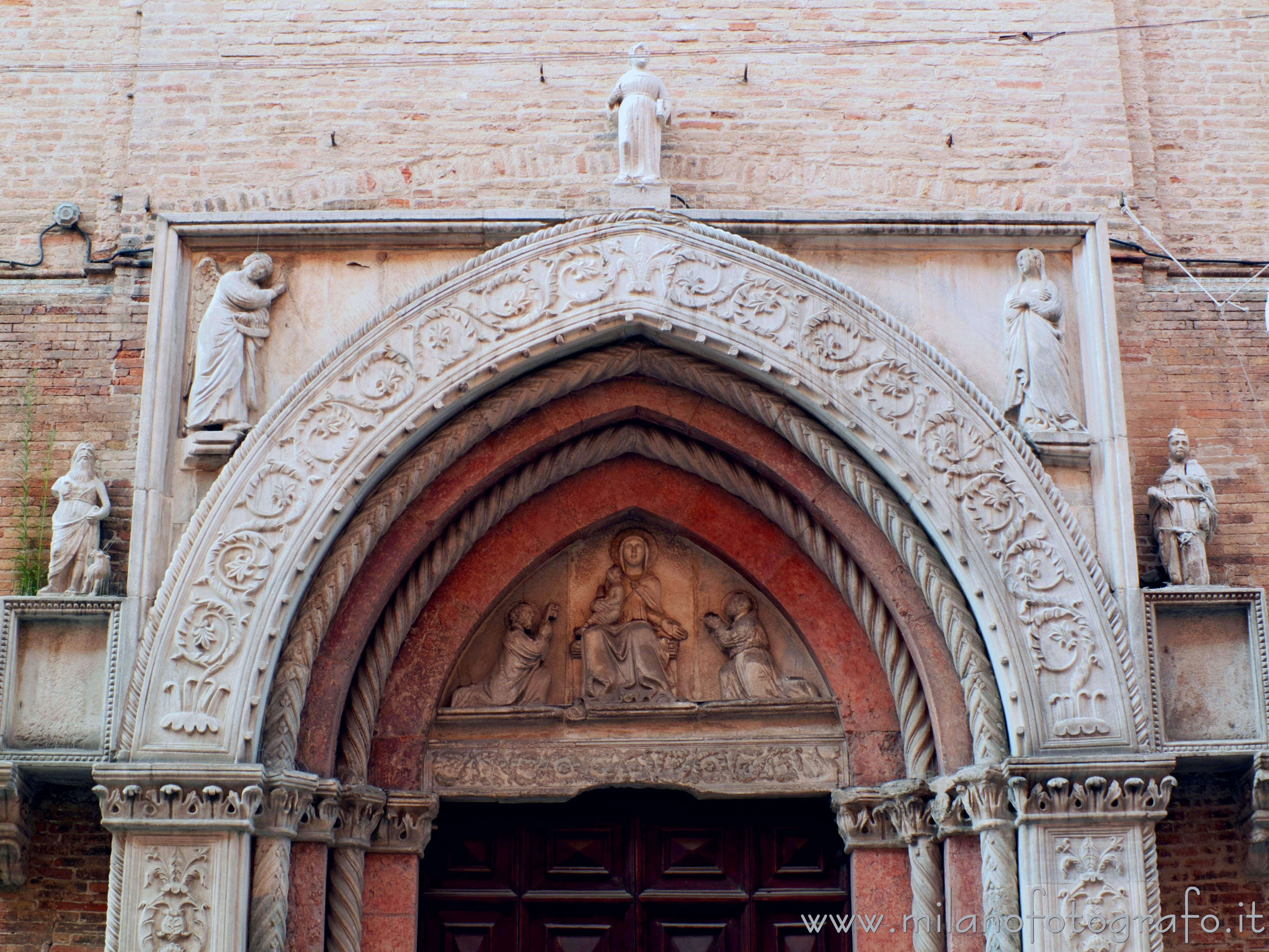 Pesaro (Pesaro e Urbino, Italy) - Upper part of the portal of the Sanctuary of Our Lady of Grace